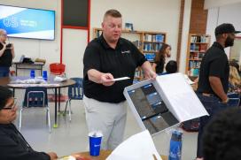 CertainTeed employee at a school talking about manufacturing workforce development for SFRC