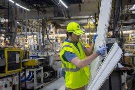 Engineer tests siding products as part of Essentials of Manufacturing, the engineering development program at Saint-Gobain North America