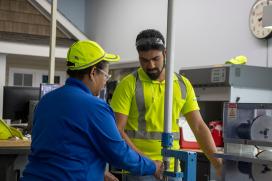 Engineer is learning a new skill in Essentials of Manufacturing, an engineering development program.