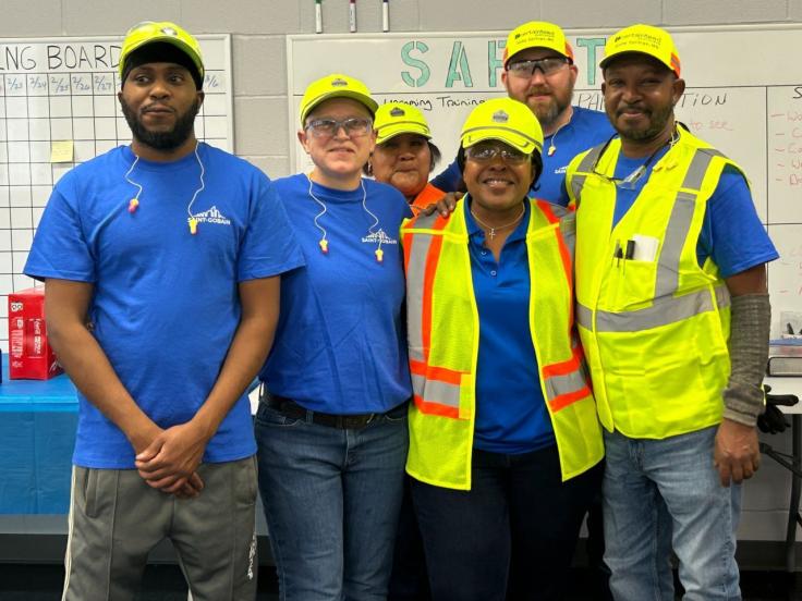 A photo featuring team members enjoying their manufacturing and operation jobs in Alberta, Canada, at a Saint-Gobain facility.