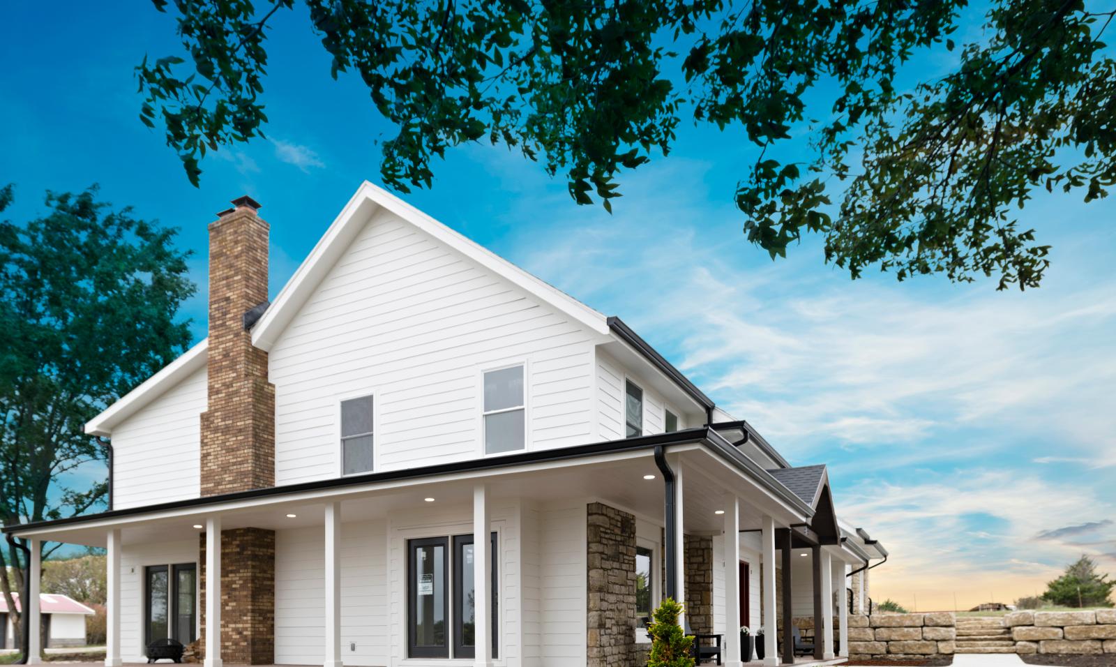 A house with white cladding 